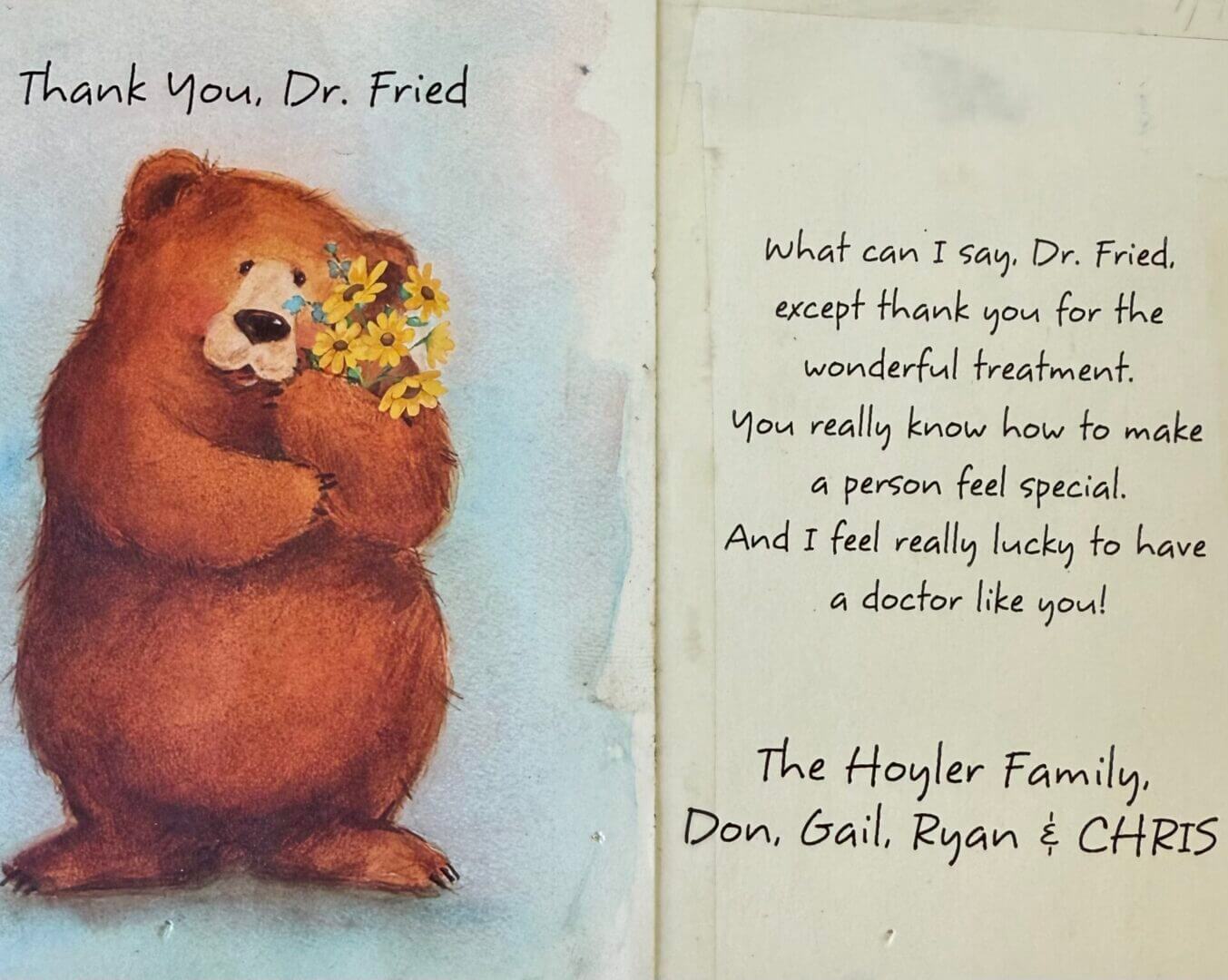 Bear holding flowers, thank you card message.
